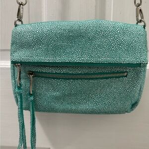 Vibrant Aqua Crossbody Bag with Flap Closure